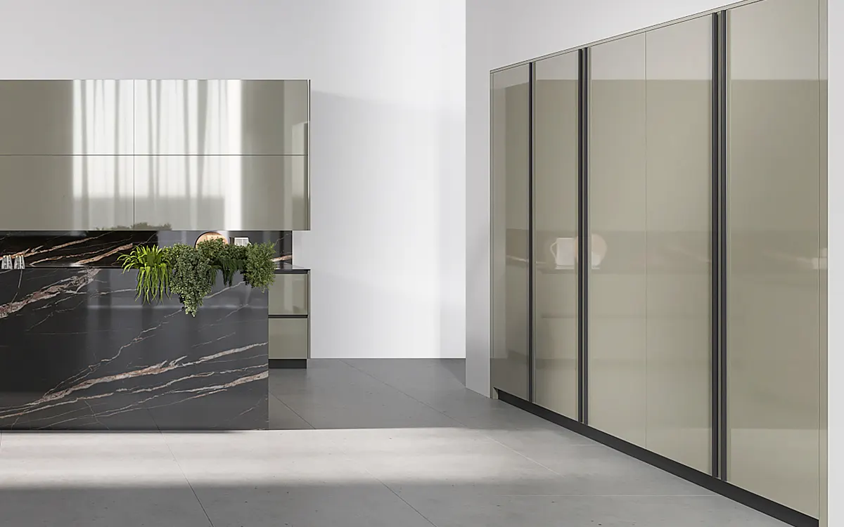 High-gloss luxury green kitchen cabinets with an island