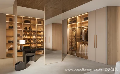 Luxury Walk in Closet with Beige and Light Wood Cabinets