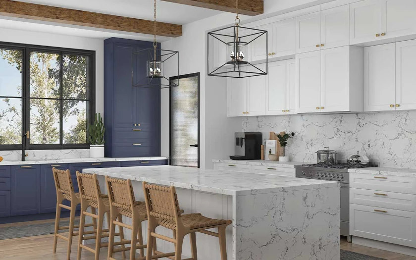 white and navy blue shaker kitchen cabinets with gold hardware